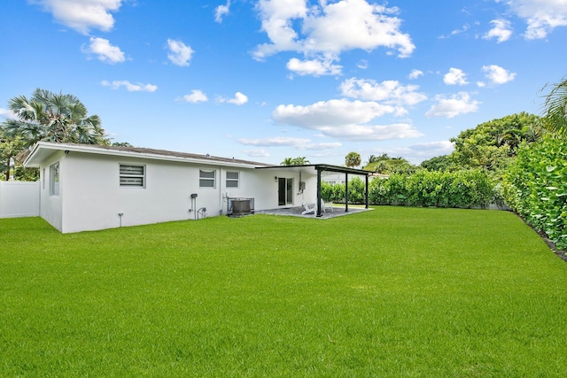 1269 NW 4th St, Boca Raton, FL 33486 - back of house with stucco siding, central AC unit, and a patio
