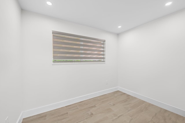 1269 NW 4th St, Boca Raton, FL 33486 - unfurnished room with light wood-style floors, recessed lighting, and baseboards