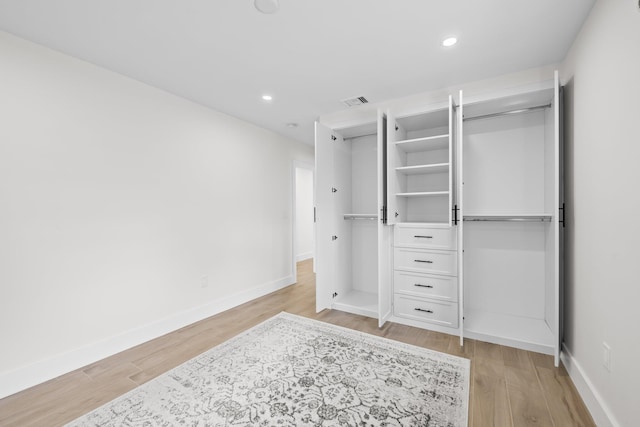 1269 NW 4th St, Boca Raton, FL 33486 - unfurnished bedroom featuring light wood-style floors, baseboards, recessed lighting, and a closet