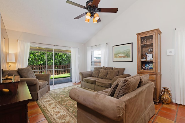 living room featuring ceiling fan, tile patterned flooring, and high vaulted ceiling