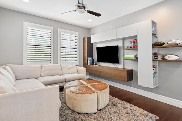 living room featuring baseboards, recessed lighting, ceiling fan, and wood finished floors