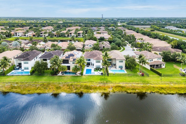 aerial view with a water view and a residential view