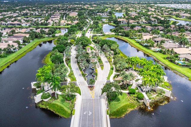 aerial view with a water view and a residential view