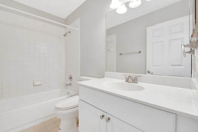 full bath featuring tile patterned floors, toilet, shower / washtub combination, and vanity