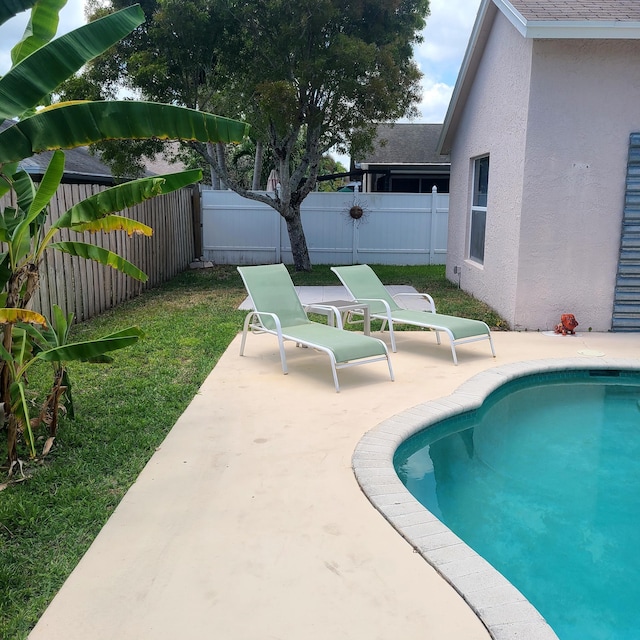 6374 Robinson St, Jupiter, FL 33458 - view of swimming pool featuring a fenced in pool, a patio area, and a fenced backyard