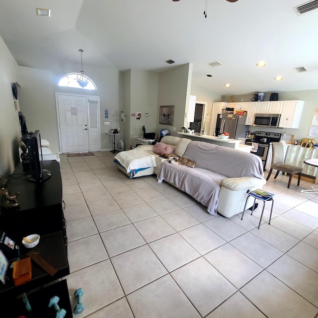 6374 Robinson St, Jupiter, FL 33458 - living room with lofted ceiling, light tile patterned flooring, and visible vents
