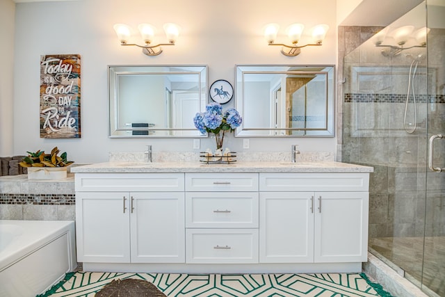 15688 Italian Cypress Way, Wellington, FL 33414 - full bath featuring a garden tub, double vanity, a sink, and a shower stall