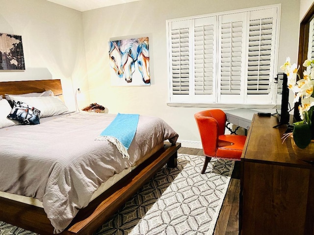 15688 Italian Cypress Way, Wellington, FL 33414 - bedroom with baseboards and wood finished floors
