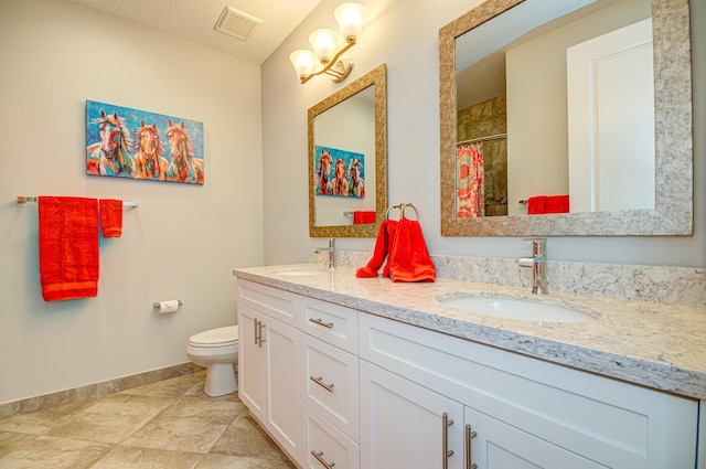 15688 Italian Cypress Way, Wellington, FL 33414 - bathroom featuring a sink, baseboards, toilet, and a textured ceiling