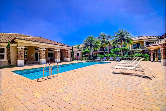 15688 Italian Cypress Way, Wellington, FL 33414 - community pool with a patio area