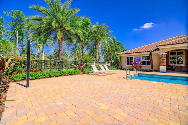 15688 Italian Cypress Way, Wellington, FL 33414 - view of swimming pool with a patio, fence, and a fenced in pool