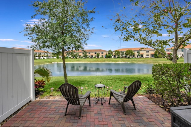 view of patio / terrace with a water view
