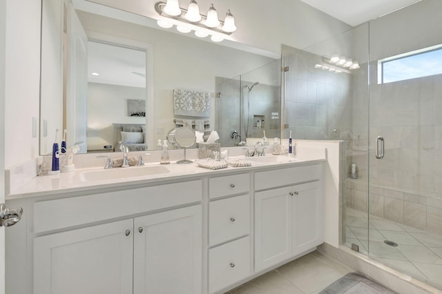 ensuite bathroom with a sink, a stall shower, and ensuite bath