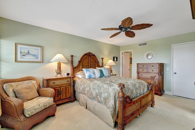 bedroom featuring ceiling fan, light carpet, and visible vents