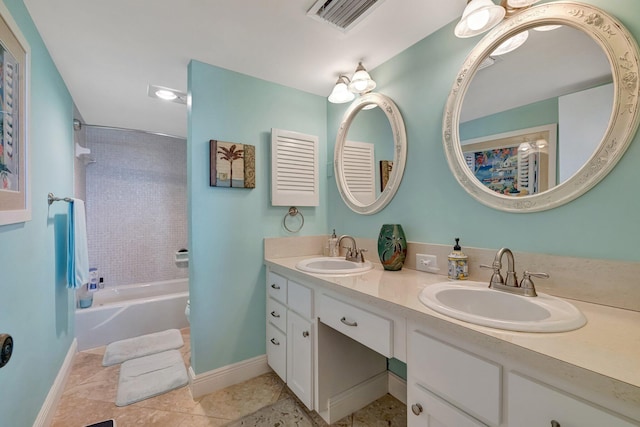 bathroom featuring a sink, baseboards, and visible vents