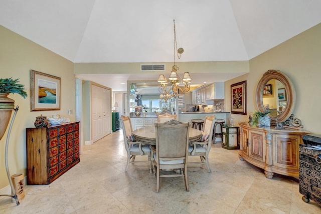 dining room featuring an inviting chandelier, baseboards, visible vents, and high vaulted ceiling