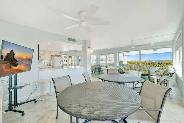 sunroom / solarium featuring visible vents