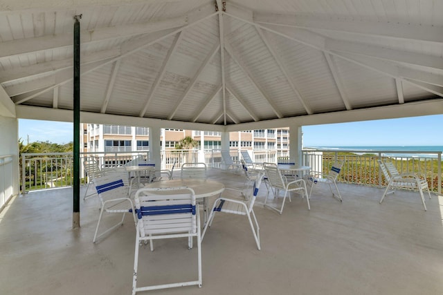 view of patio / terrace featuring outdoor dining area and a water view