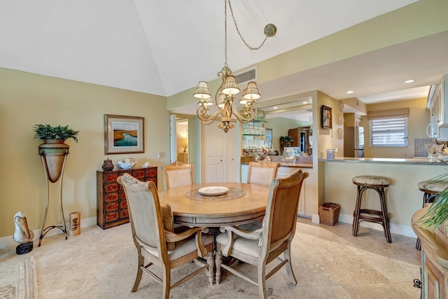 dining area featuring a notable chandelier, recessed lighting, baseboards, lofted ceiling, and visible vents