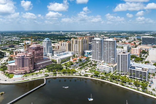 aerial view with a water view and a city view