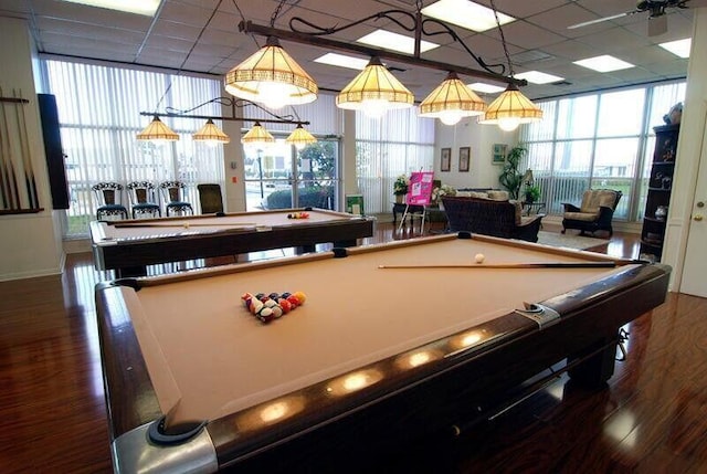 rec room featuring billiards, wood finished floors, a paneled ceiling, and plenty of natural light