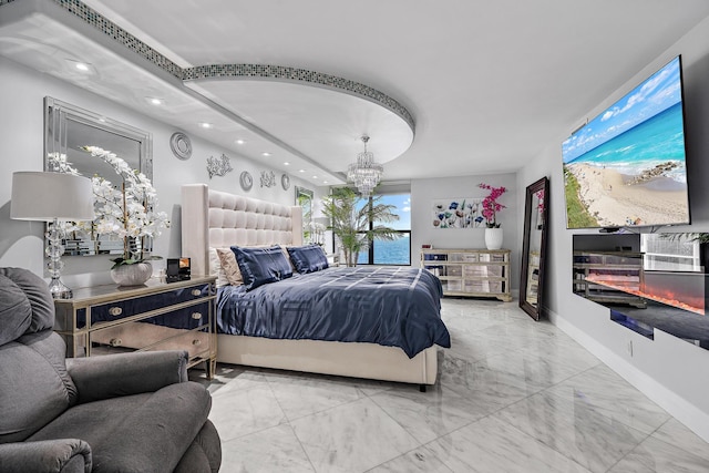 3610 S Ocean Blvd Unit 405, South Palm Beach, FL 33480 - bedroom with recessed lighting, marble finish flooring, a chandelier, and baseboards