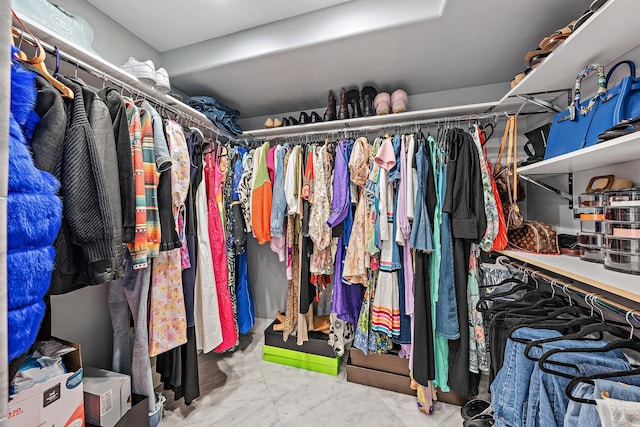 3610 S Ocean Blvd Unit 405, South Palm Beach, FL 33480 - walk in closet with marble look tile flooring