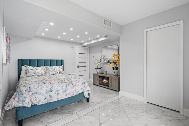 3610 S Ocean Blvd Unit 405, South Palm Beach, FL 33480 - bedroom featuring marble look tile flooring, recessed lighting, and baseboards