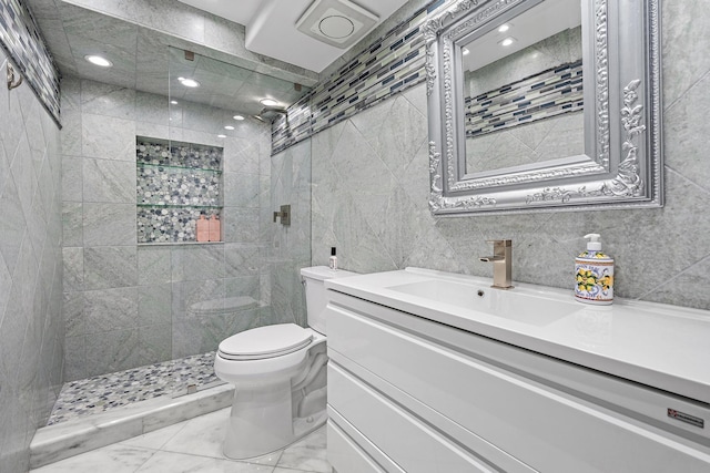 3610 S Ocean Blvd Unit 405, South Palm Beach, FL 33480 - full bath featuring tile walls, toilet, a stall shower, vanity, and recessed lighting