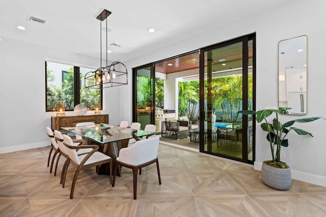 dining space with recessed lighting, visible vents, and baseboards