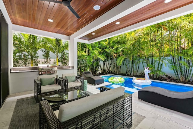 view of patio / terrace with a fenced in pool, a grill, ceiling fan, an outdoor hangout area, and area for grilling