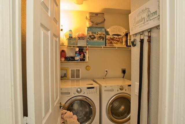 2102 Little Torch St, Riviera Beach, FL 33407 - washroom with separate washer and dryer and laundry area