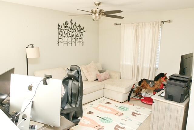 2102 Little Torch St, Riviera Beach, FL 33407 - living room with a ceiling fan