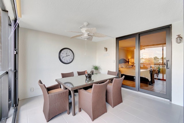 3420 S Ocean Blvd Unit 3W, Highland Beach, FL 33487 - dining room with ceiling fan, a textured ceiling, and light tile patterned floors