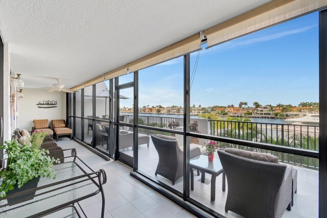 3420 S Ocean Blvd Unit 3W, Highland Beach, FL 33487 - sunroom / solarium with a water view and ceiling fan