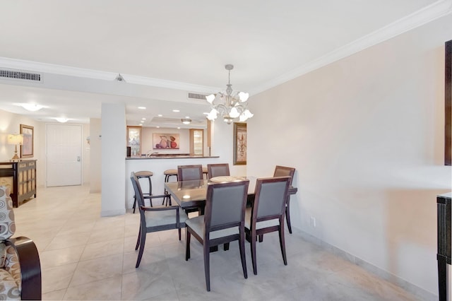 3420 S Ocean Blvd Unit 3W, Highland Beach, FL 33487 - dining space with crown molding, a chandelier, light tile patterned floors, and baseboards