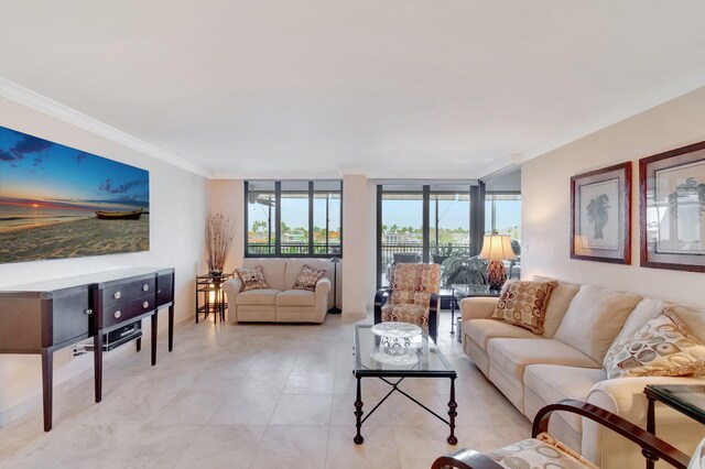 3420 S Ocean Blvd Unit 3W, Highland Beach, FL 33487 - living room featuring crown molding and light tile patterned floors