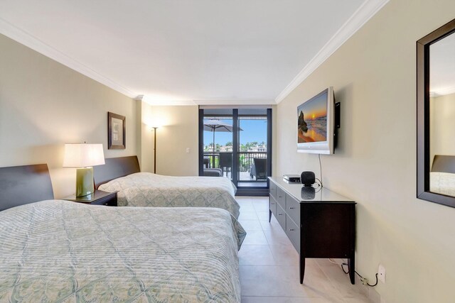 3420 S Ocean Blvd Unit 3W, Highland Beach, FL 33487 - bedroom with access to exterior, crown molding, light tile patterned floors, and a wall of windows