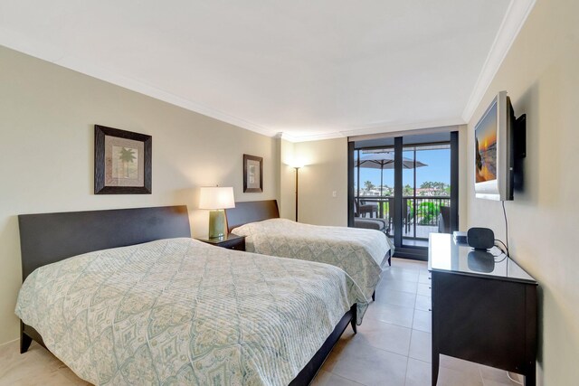 3420 S Ocean Blvd Unit 3W, Highland Beach, FL 33487 - bedroom with access to exterior, ornamental molding, and light tile patterned floors