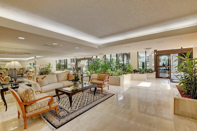 3420 S Ocean Blvd Unit 3W, Highland Beach, FL 33487 - lobby featuring a textured ceiling and recessed lighting