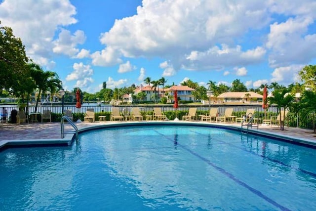 3420 S Ocean Blvd Unit 3W, Highland Beach, FL 33487 - community pool with a patio area