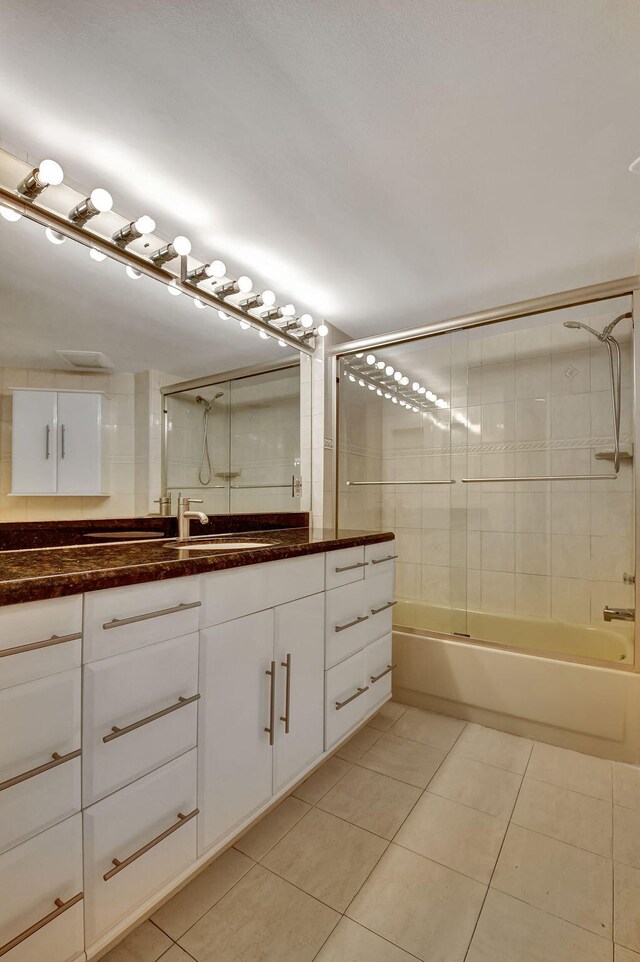 6372 La Costa Dr Unit 302, Boca Raton, FL 33433 - full bathroom with tile patterned floors, vanity, and shower / bathtub combination