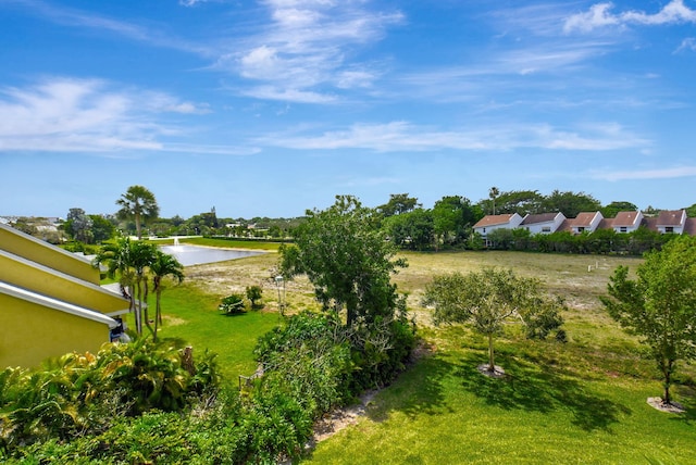 6372 La Costa Dr Unit 302, Boca Raton, FL 33433 - view of green lawn featuring a water view