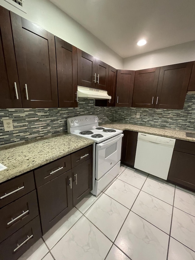 642 NW 13th St Unit 31, Boca Raton, FL 33486 - kitchen featuring decorative backsplash, dark brown cabinetry, under cabinet range hood, white appliances, and marble finish floor