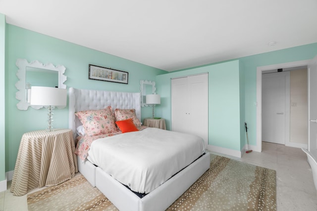 2773 S Ocean Blvd Unit 209, Palm Beach, FL 33480 - bedroom featuring a closet and baseboards