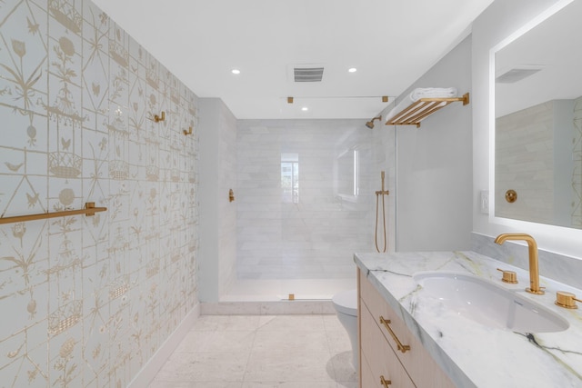 2773 S Ocean Blvd Unit 209, Palm Beach, FL 33480 - bathroom with toilet, a walk in shower, visible vents, vanity, and recessed lighting