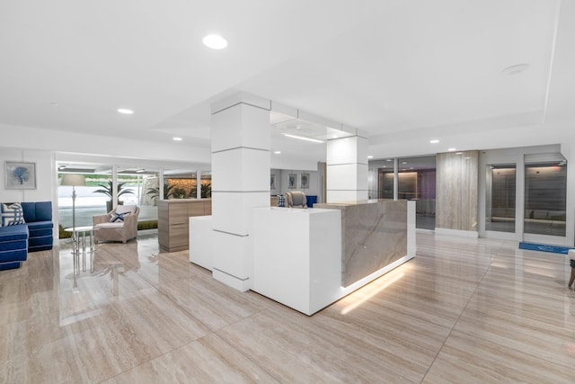 2773 S Ocean Blvd Unit 209, Palm Beach, FL 33480 - interior space with light tile patterned floors, white cabinets, modern cabinets, light countertops, and recessed lighting