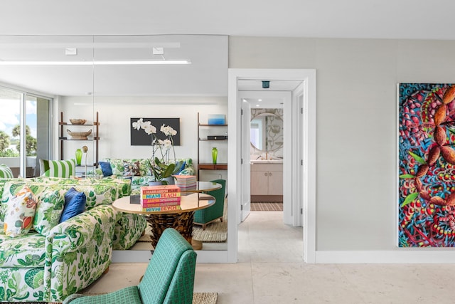 2773 S Ocean Blvd Unit 209, Palm Beach, FL 33480 - living room featuring baseboards