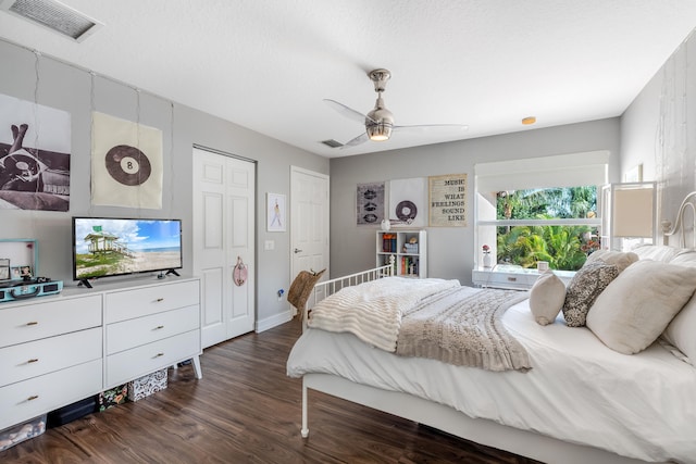 8533 Briar Rose Pt, Boynton Beach, FL 33473 - bedroom with dark wood-type flooring, ceiling fan, and baseboards