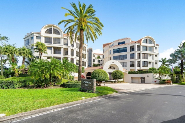 7383 Orangewood Ln Unit 304, Boca Raton, FL 33433 - view of apartment building / complex featuring a garage